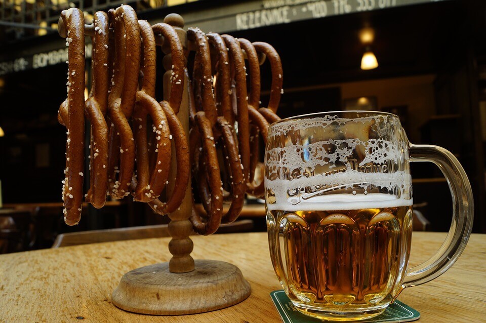 an image of pretzels and half-empty keg 