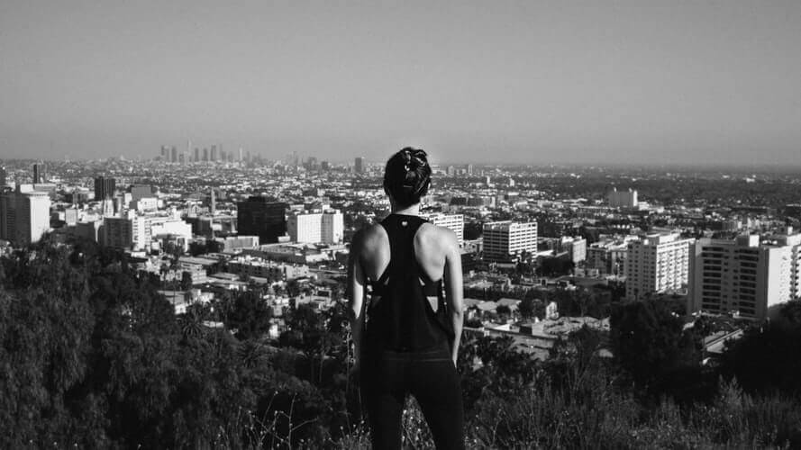 A woman observing the view from Runyon Canyon