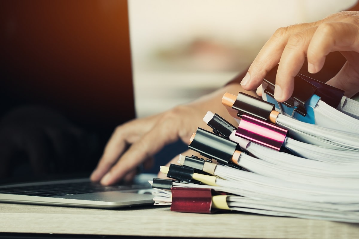  Multiple binders a person waiting for an LA moving company laid on the table