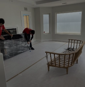 Movers packing an apartment