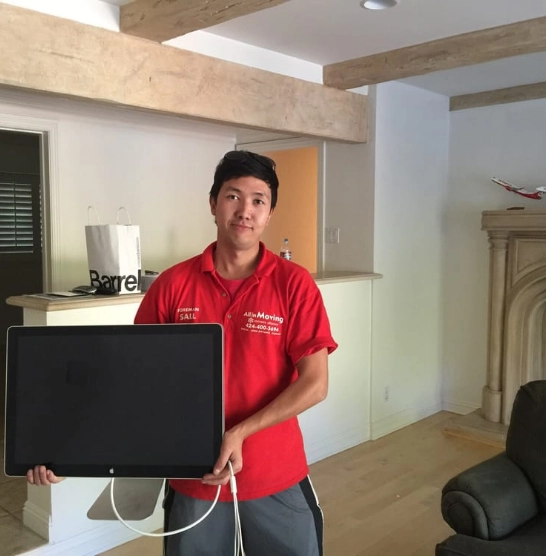 Mover holding a monitor