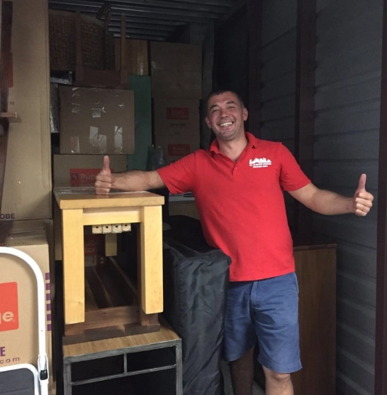 Mover holding thumbs up